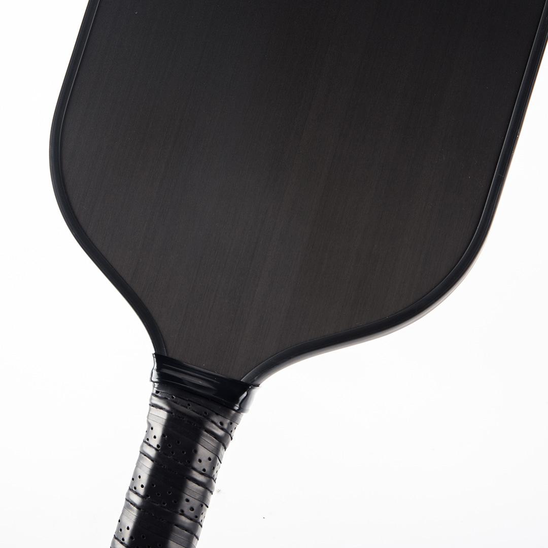 t700 pickleball paddle carbon fiber texture close up 2026